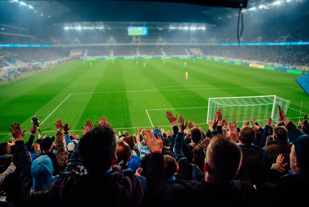 A view from the stands watching a football match